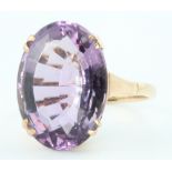 A 9ct yellow gold oval amethyst ring size J 1/2