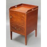 A Georgian mahogany commode with three-quarter gallery fitted a cupboard above a drawer, raised on