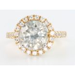 An 18ct yellow gold brilliant cut diamond ring, the centre stone approx. 3.72ct surrounded by