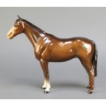 A Beswick figure of a brown race horse 10"