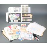 A collection of presentation and used World stamps and a small collection of Continental "cigarette"