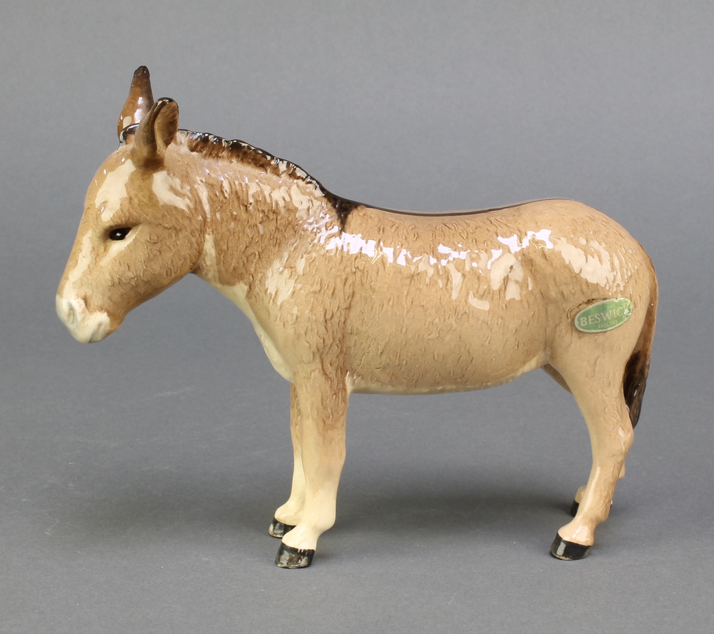 A Beswick figure of a donkey 6 1/2"