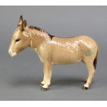 A Beswick figure of a donkey 6 1/2"