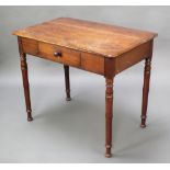 A Victorian rectangular mahogany side table fitted a drawer and raised on turned supports 29"h x