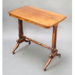 A Victorian rectangular walnut stretcher table raised on pierced panel end supports with H framed