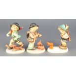 3 Hummel figures - boy with red rabbit 6/0 5 1/4", violin player with puppy 5 1/4" and boy with