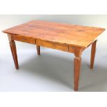 A 19th Century rectangular Continental hardwood dining table fitted 2 frieze drawers, raised on