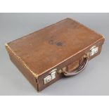 A leather finished attache case with George VI cypher 7" x 15"w x 10"d There is some scuffing to the