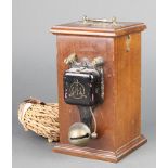 An Edwardian invalid call bell contained in a mahogany case