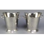 A pair of plated 2 handled tapered wine coolers with chased armorials 9"
