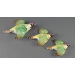 A set of Beswick Green Woodpecker wall plaques 1344/1/2/3 7 1/2", 6" and 5"