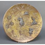 A Japanese gilt metal and antimony charger decorated figures and flowers 17 1/2"