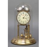Welby, a 400 day clock with enamelled dial and Arabic numerals complete with glass dome