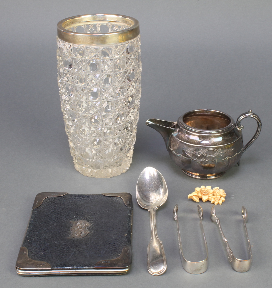 An Edwardian silver mounted leather wallet London 1901, a silver collared cut glass vase, a