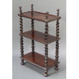 A William IV rectangular rosewood 3 tier what-not, raised on spiral turned supports with bun feet,