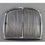 A Jaguar 420 chrome radiator grill 17" x 19 1/2" There is some slight pitting and a small dent to