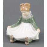 A Royal Copenhagen dish in the form of a young girl holding out her apron