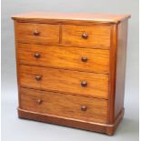 A Victorian mahogany D shaped chest of 2 short and 3 long drawers with tore handles, raised on a