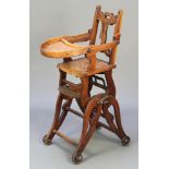 A child's Edwardian oak metamorphic high chair with shaped slat back (f)