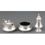 A Sterling silver 3 piece condiment with blue glass liners 104 grams