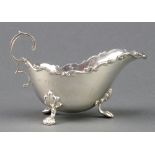 An Edwardian silver sauce boat with fancy rim and pad feet Birmingham 1910, 100 grams