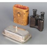 A Chatelain, a pair of French binoculars with leather carrying case and a plated butter dish