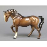 A Beswick figure of a brown horse 9"