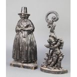 A Victorian cast iron door stop in the form of a cherub 16" and 1 other door stop in the form of a