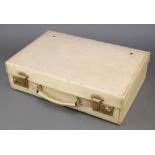 A parchment attache case with brass locks 4" x 16" x 10 1/2" There is some light scuffing