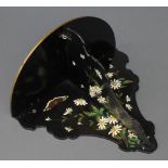 A Victorian black papier mache folding wall bracket decorated daisies and butterflies 11" x 7" x 13"