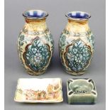 A pair of Doulton and Slaters oviform vases decorated with stylised flowers on a blue green ground 6