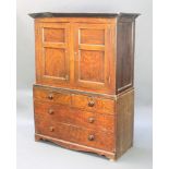 A Victorian painted pine cabinet, the upper section with moulded cornice enclosed by a pair of