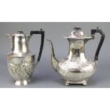 A silver plated repousse coffee pot with ebonised handle, a ditto teapot