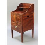 A Georgian mahogany commode with leather inset top, the raised back with three-quarter gallery