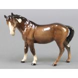 A Beswick figure of a standing horse 9 1/2"