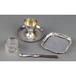 A silver egg cup Birmingham 1946, ditto napkin ring, dish and pair of tweezers, weighable silver 116