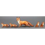 2 Beswick figures Standing Fox 17484 3", 2 seated ditto 1743 2" and a large standing ditto 1016A