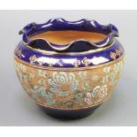 A Royal Doulton jardiniere, the blue ground with a band of stylised flowers 7 1/2"
