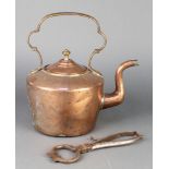 A 19th Century copper kettle 12" together with a pair of polished steel sugar cutters