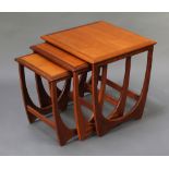 A nest of 3 1960's teak G Plan Astro interfitting coffee tables 20"h x 19 1/2" square, 19"h x 16 1/