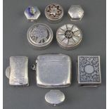 A silver niello match box case, 7 pill boxes and a vesta