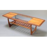 A G-Plan Astro rectangular teak coffee table, the centre section inset a plate glass panel above a