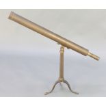 Dolland of London, a 19th Century brass single draw table telescope raised on tripod base,