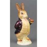 A Beswick Beatrix Potter figure Mr Benjamin Bunny (dark maroon jacket) 1940 4 1/4"