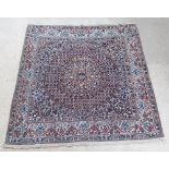 A white and blue ground Persian Nain carpet with central medallion 74" x 74"