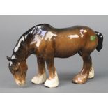 A Beswick figure Grazing Shire horse 1050 5 1/2" with stuck on label