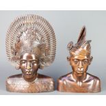A pair of Balinese carved hardwood portrait busts of a lady 15" and gentleman 12" There is damage