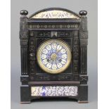 An 8 day striking mantel clock with blue and white porcelain dial, Arabic numerals, contained in