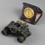 A pair of Bausch & Lomb military Stereo 6 x 39 field glasses together with an 8 day travelling clock