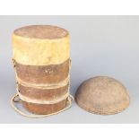 A cylindrical tribal drum 13"h x 8" diam. together with a circular African basket 10"